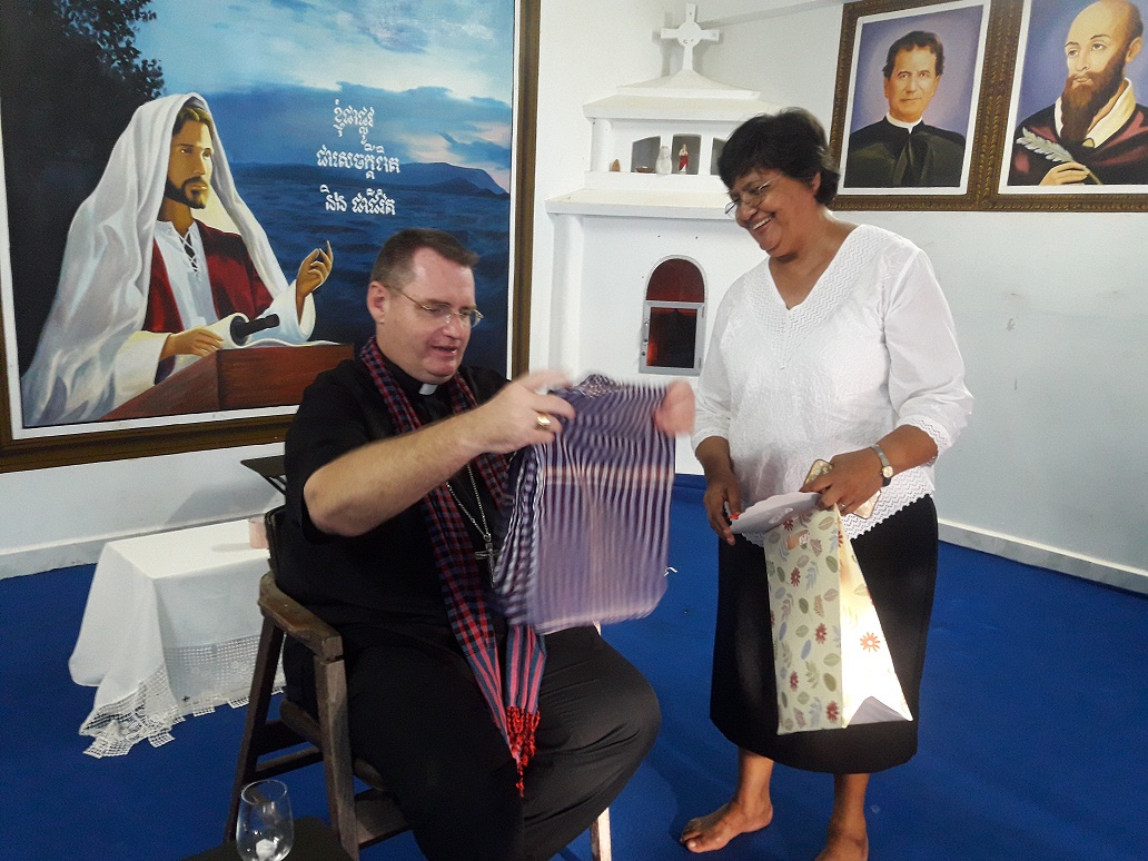 Sister Juanita gives a gift to Bishop Olivier on May 23 2017.jpg